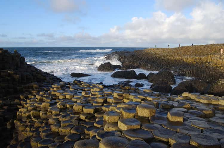 The Giant's Causeway Was Created When Molten Lava Cooled, Contracted, And Cracked When It Reached The Sea
